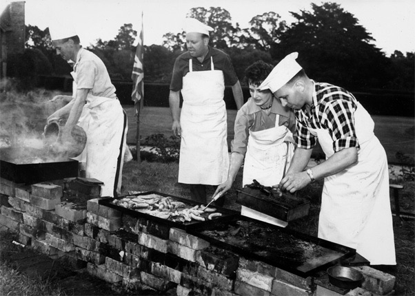Eric Lyons barbecuing at Grimshaw Hall