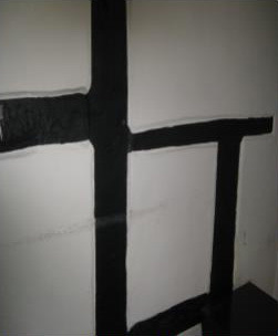 Timbered wall in office above Butchers shop